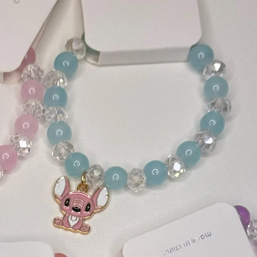Colorful Kids Beaded Stretch Bracelet Purple beads green charm